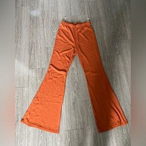Orange flare pants